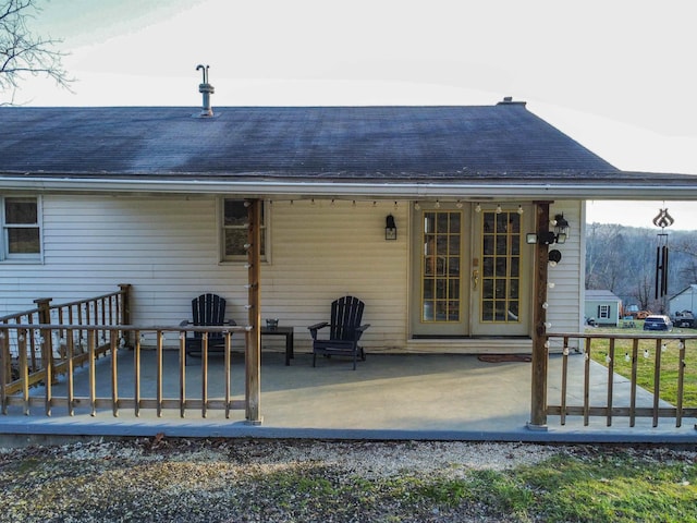 back of house with a patio area and french doors