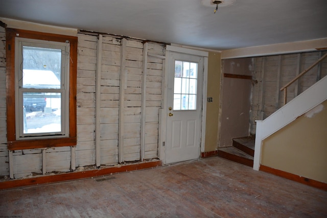 entrance foyer featuring hardwood / wood-style flooring