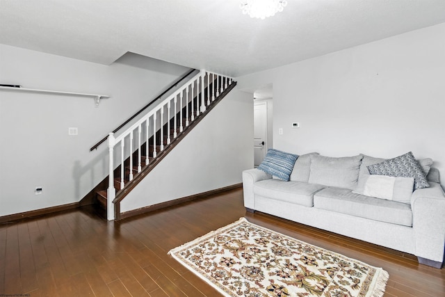 living room featuring dark hardwood / wood-style floors