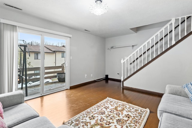 living room with hardwood / wood-style floors