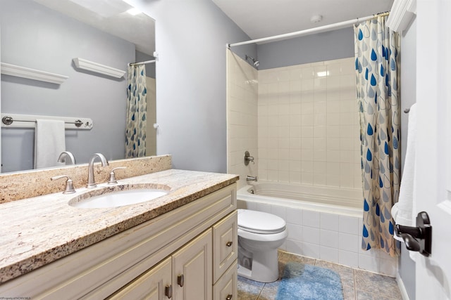 full bathroom with vanity, tile patterned floors, toilet, and shower / bath combo with shower curtain