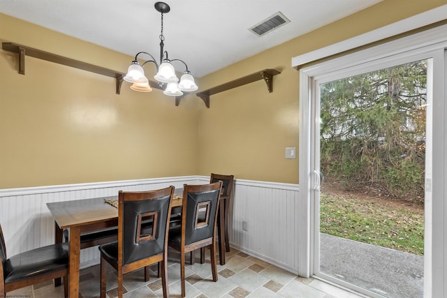 dining room with a chandelier