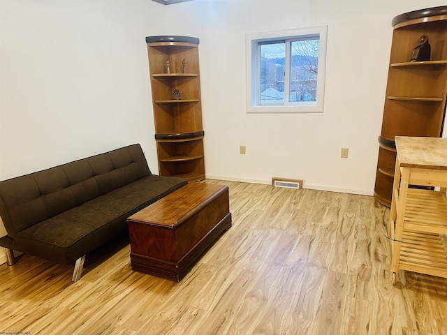 living room featuring light wood-type flooring