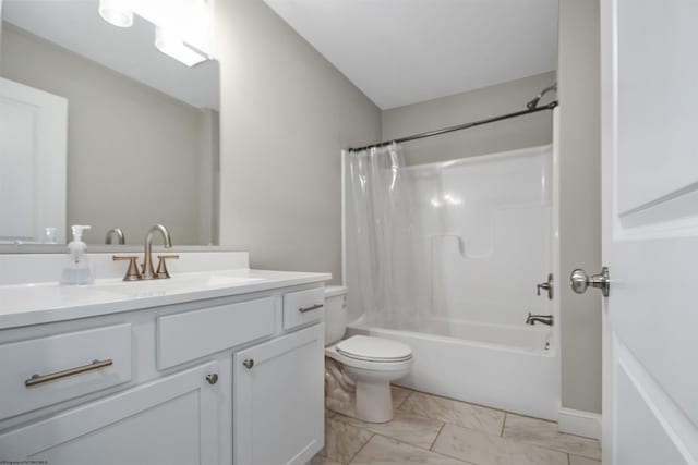 full bathroom featuring vanity, toilet, and shower / tub combo