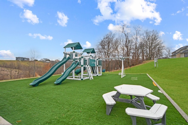 view of play area featuring a lawn