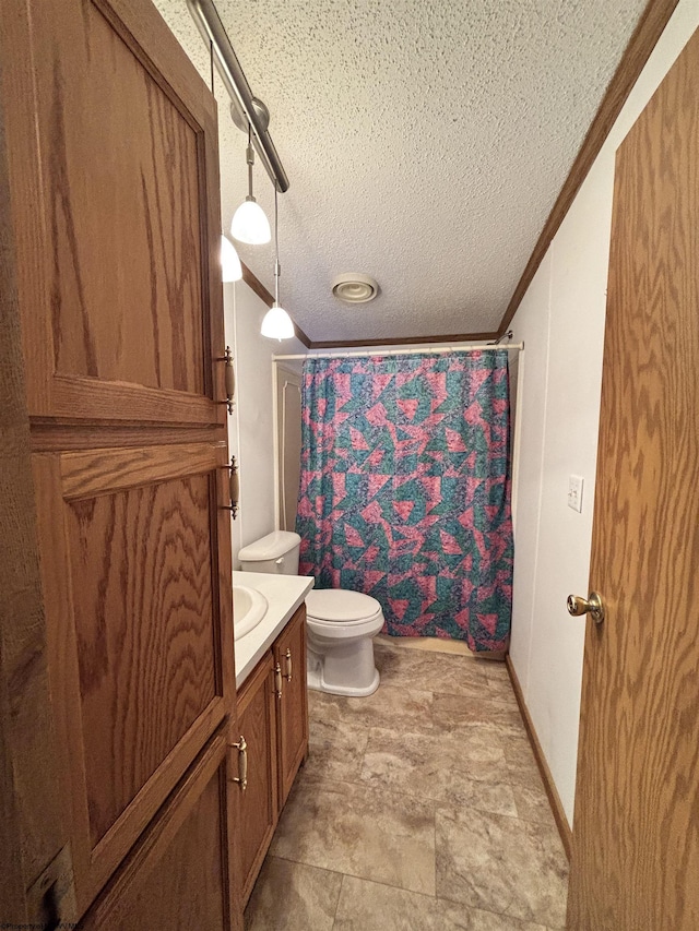 bathroom featuring walk in shower, toilet, crown molding, a textured ceiling, and vanity