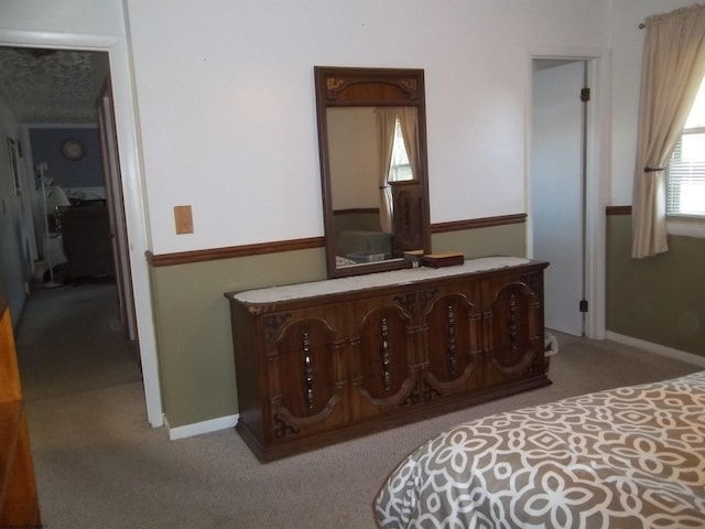 bedroom featuring carpet