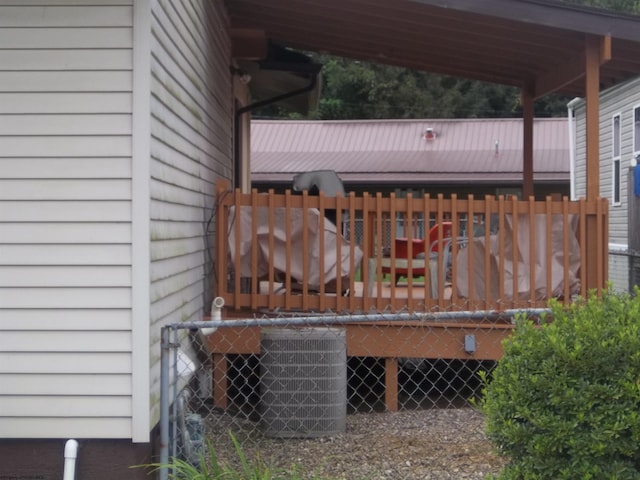 wooden terrace featuring central AC