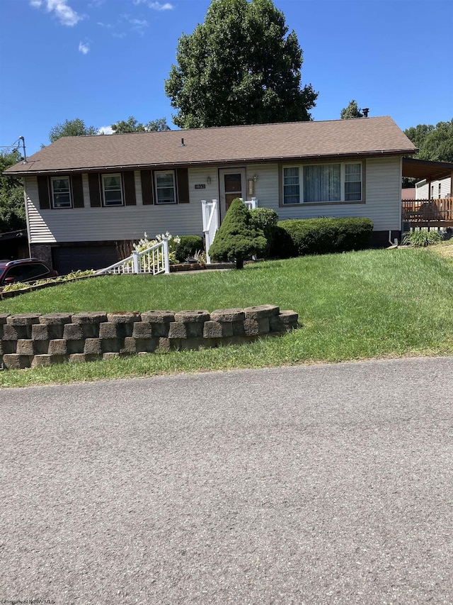 ranch-style home featuring a front lawn