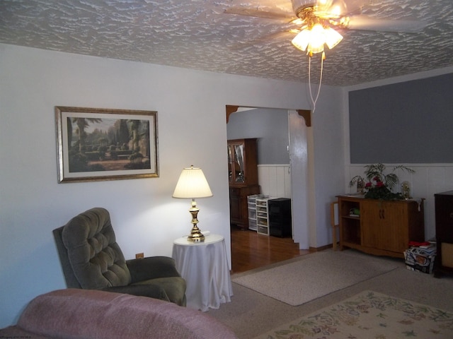 living room featuring a textured ceiling