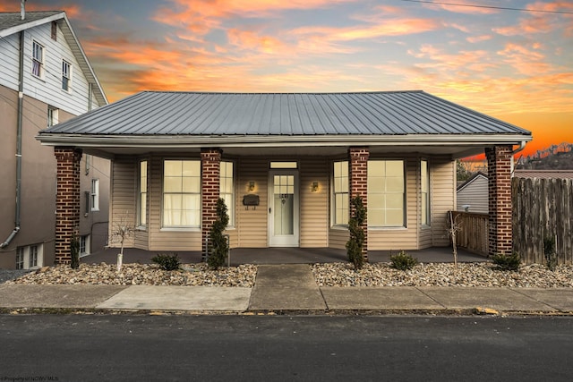 view of front of property featuring covered porch