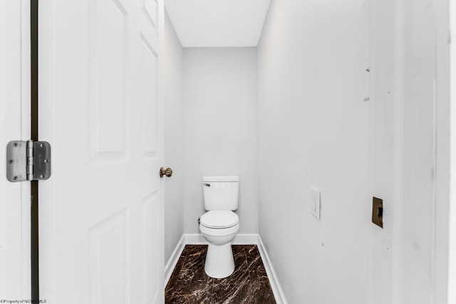 bathroom featuring toilet