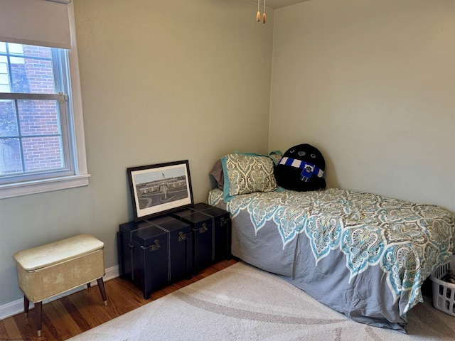 bedroom featuring hardwood / wood-style floors