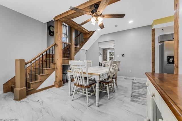 dining room with ceiling fan