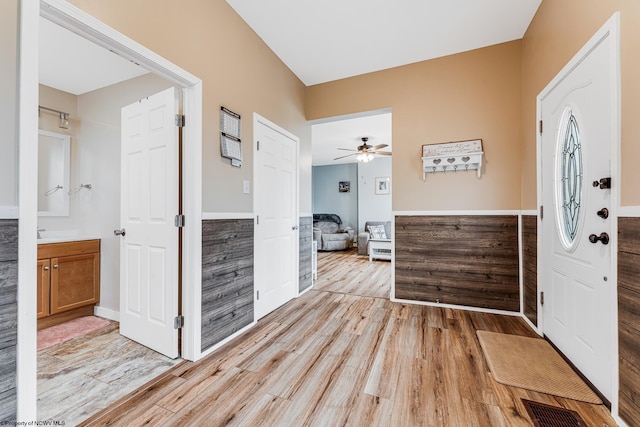 foyer entrance featuring light wood-type flooring