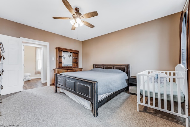 bedroom with ceiling fan and carpet flooring