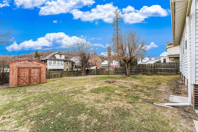 view of yard with a storage shed