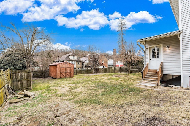 view of yard featuring a storage shed