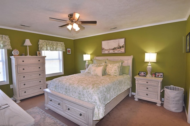 carpeted bedroom with crown molding and ceiling fan