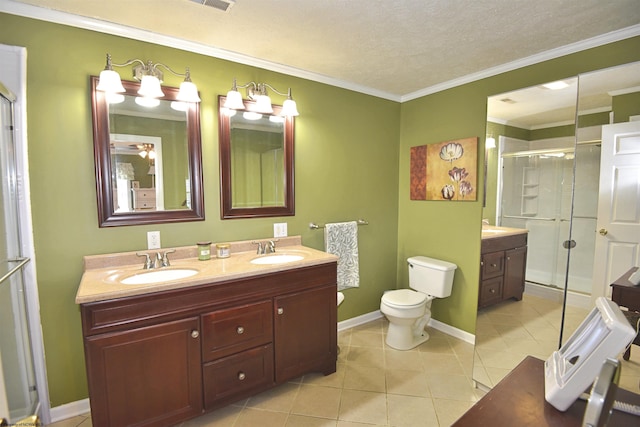 bathroom with an enclosed shower, vanity, ornamental molding, tile patterned floors, and toilet