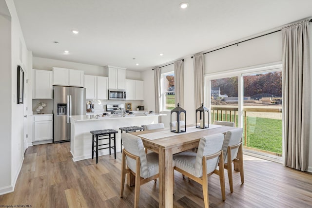 dining area featuring light hardwood / wood-style floors