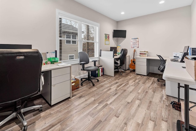 office space featuring light wood-type flooring