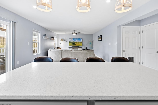 dining room with ceiling fan