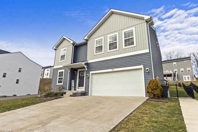 view of front of property featuring a garage and a front lawn