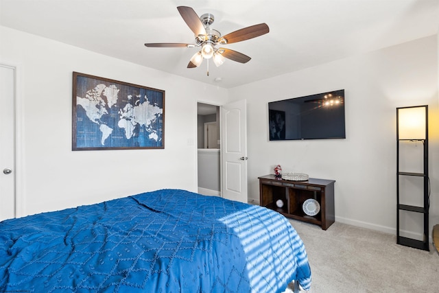 bedroom with light colored carpet and ceiling fan