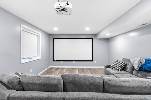 home theater featuring wood-type flooring