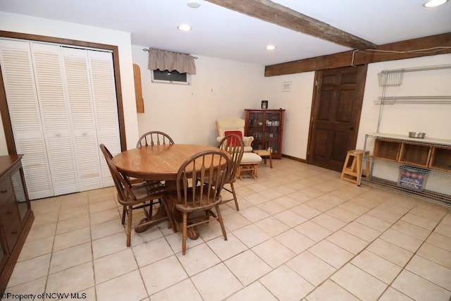 dining area with light tile patterned flooring, beamed ceiling, and recessed lighting