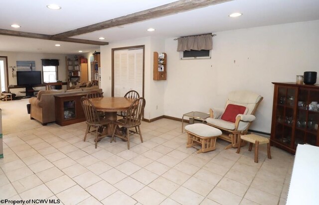 dining room with baseboards, beam ceiling, and recessed lighting