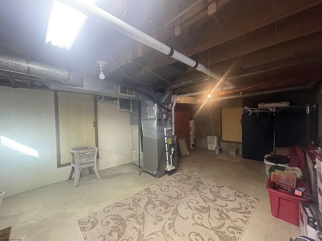 basement featuring heating unit