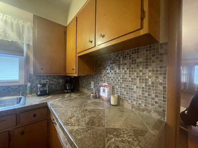 kitchen with backsplash and sink