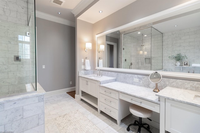 bathroom with crown molding, tiled shower, and vanity