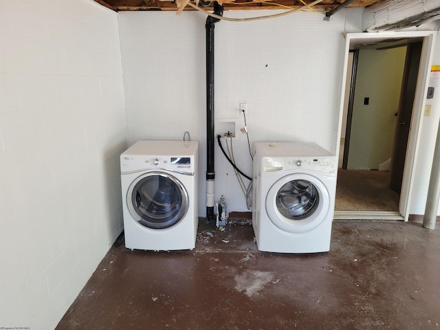 929 Garrison Ave, Morgantown, WV 26505 - laundry area featuring washing machine and dryer and concrete block wall