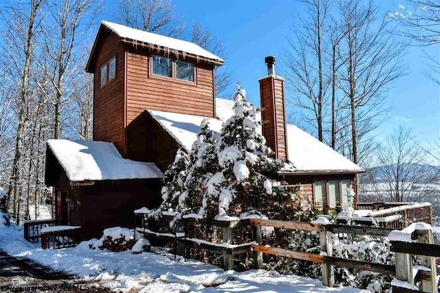 view of snow covered property