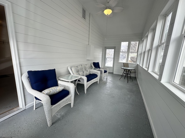 sunroom / solarium featuring vaulted ceiling and ceiling fan