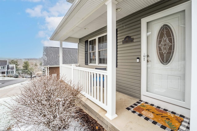 entrance to property with covered porch