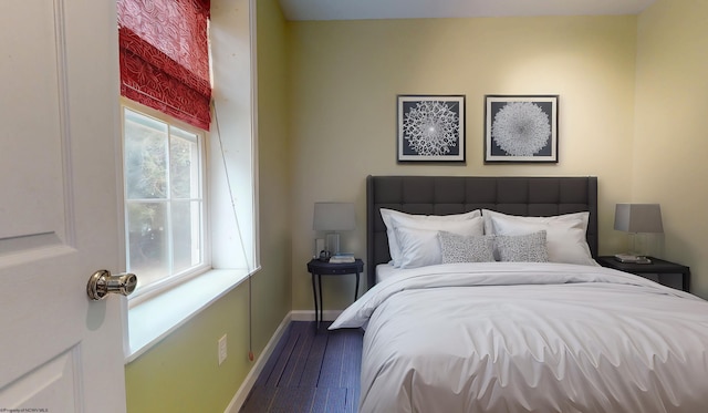 bedroom featuring wood-type flooring