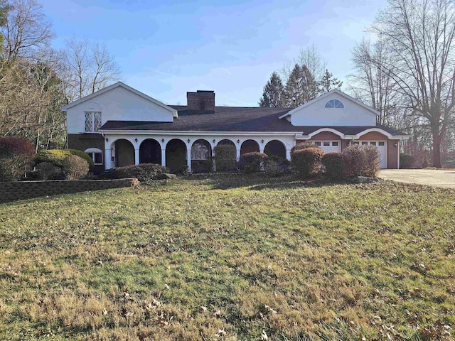 view of front of home with a front yard