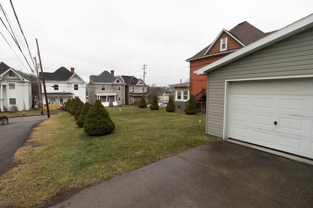 view of yard with a garage