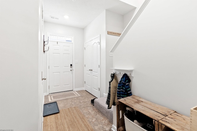 mudroom with baseboards and visible vents