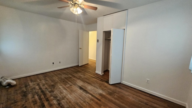 unfurnished bedroom with a ceiling fan, a closet, dark wood finished floors, and baseboards