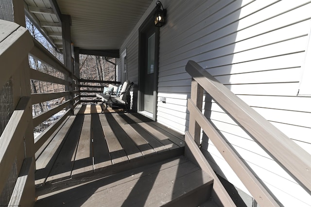 wooden deck featuring covered porch