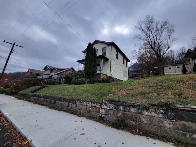 exterior space with a front yard