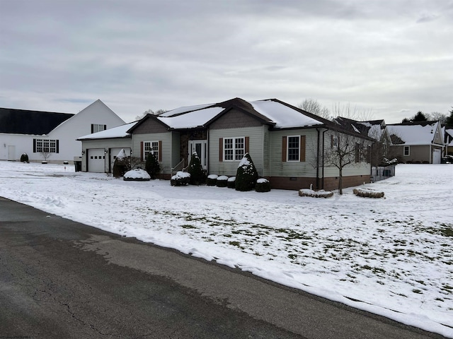 single story home featuring a garage and crawl space