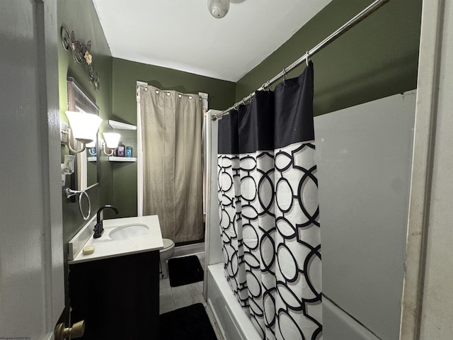 bathroom featuring vanity, toilet, and shower / bath combo with shower curtain