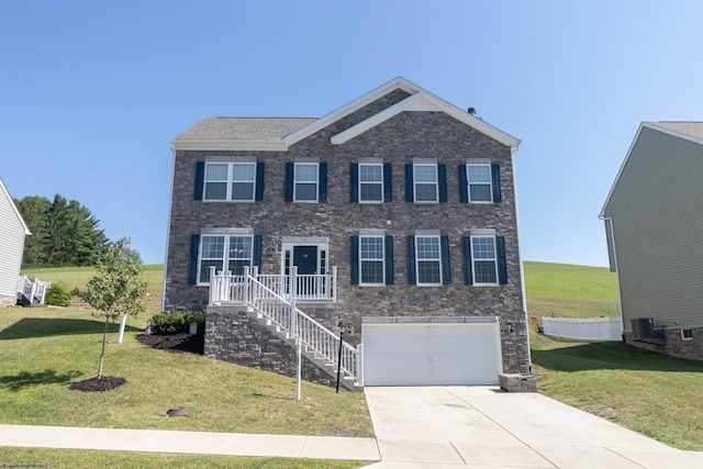 view of front of property featuring concrete driveway, an attached garage, a front lawn, and stairs