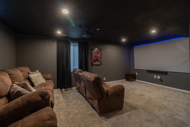 cinema room featuring recessed lighting, light colored carpet, and baseboards